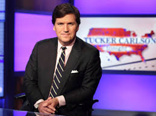 a close photo of Tucker Carlson