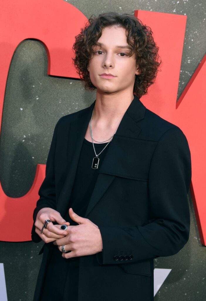 a close photo of Mason Thames in black dress