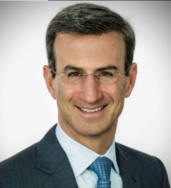 a close photo of Peter Orszag Bald